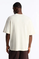 Camiseta Henley Clássica com Textura Waffle - Creme